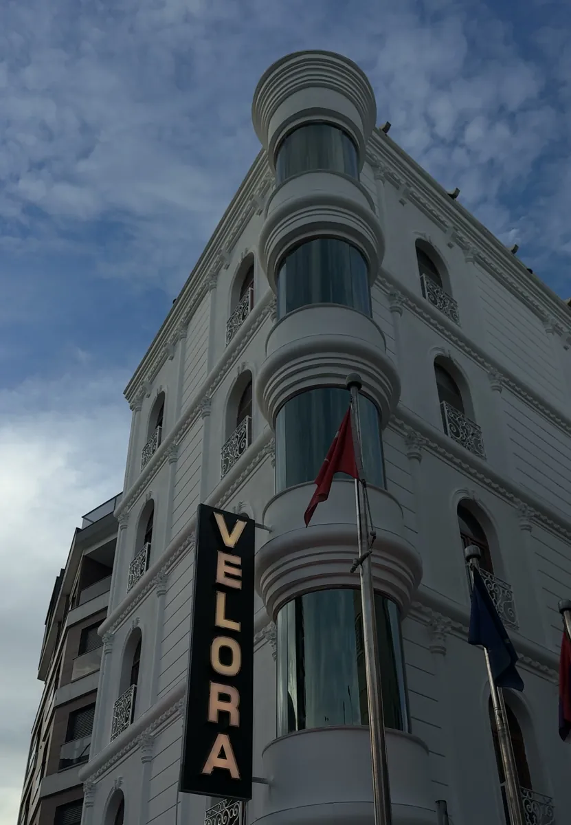 Velora Grand tower, facade with the vertical VELORA sign