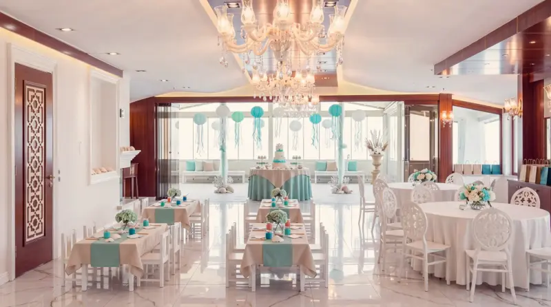 Ocean concept for a children's birthday: overall view of hall and terrace from the farthest corner